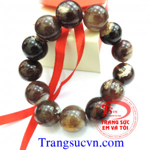 Vòng tay gỗ hóa thach nâu  Chuỗi vòng gỗ hóa thạch nâu thiên nhiên   Kích thước:  16,5 ly  Số lượng hạt gỗ hóa đá: 13 viên