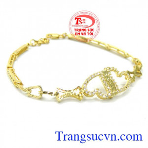 Bán sản phẩm lắc tay vàng đá quý chế tác kiểu trái tim đôi chung tình ngọt ngào cho phái nữ. 