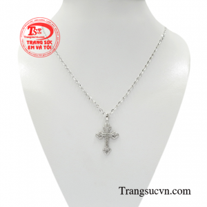 Bộ thánh giá vàng trắng phước lành như sự chở che của Chúa dành cho con người chúng ta.