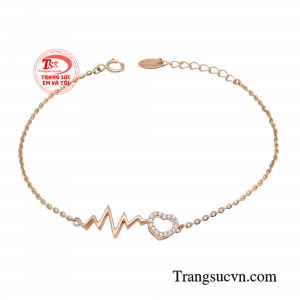 Lắc tay nhịp đập trái tim vàng hồng với thiết kế trẻ trung và cá tính.