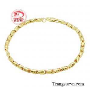 Lắc tay nam vàng tự tin với thiết kế dạng mắt xích trải qua những thăng trầm và biến động của thời gian