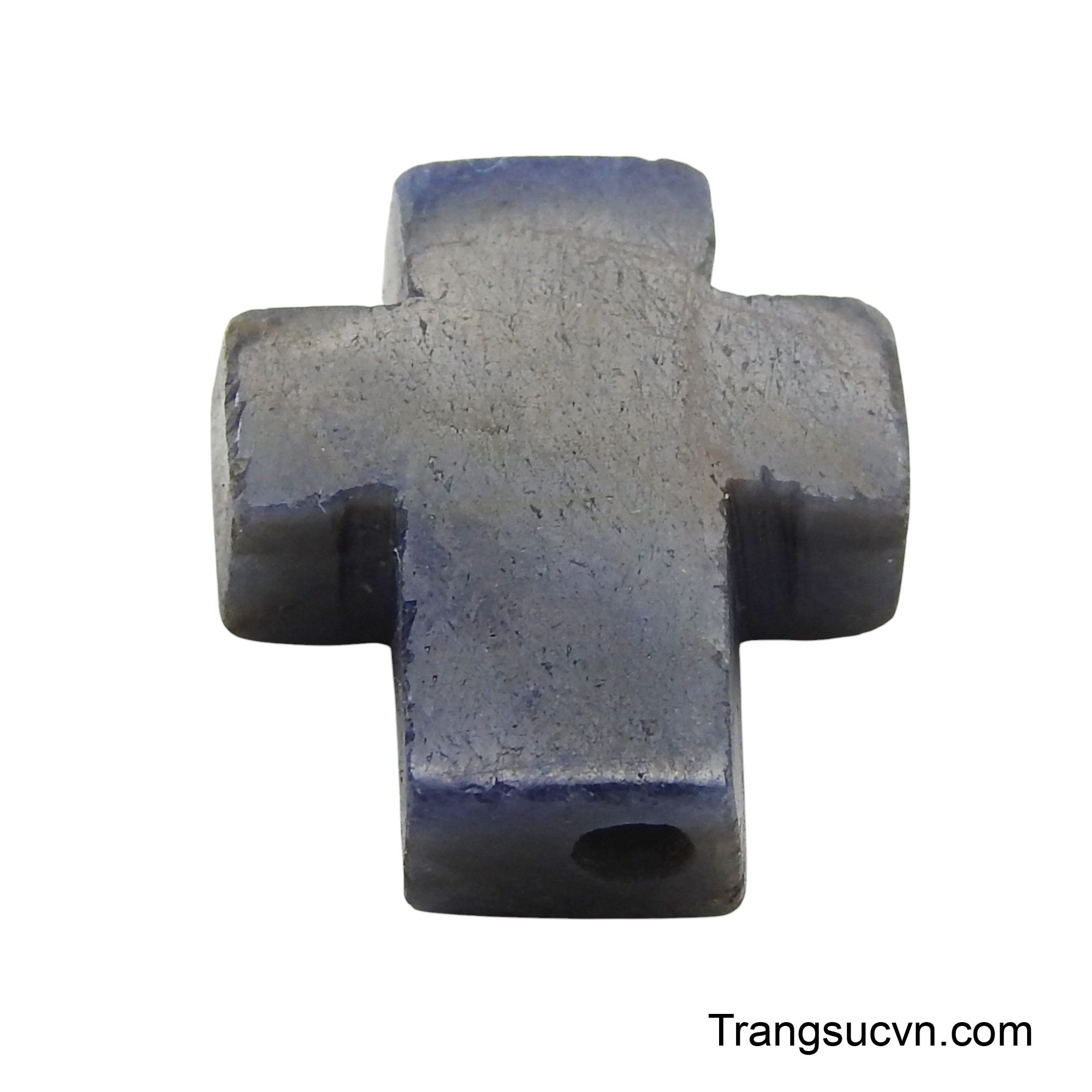 Viên đá sapphire nguyên khối với sắc xanh thẫm đặc trưng, toát lên vẻ đẹp trang nghiêm và linh thiêng.
