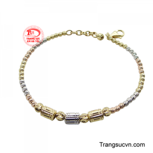 Lắc tay nổi bật với chuỗi hạt bi đa sắc thái, tạo hiệu ứng thị giác lấp lánh và cuốn hút.