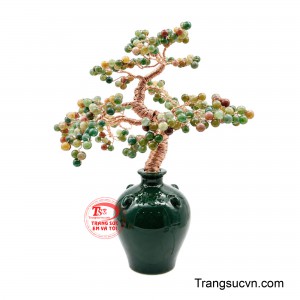 Cây Canxedon Ngũ Sắc là tác phẩm phong thủy độc đáo, kết hợp vẻ đẹp tự nhiên của những viên canxedon đa sắc với nghệ thuật chế tác cây đá thủ công tinh tế.