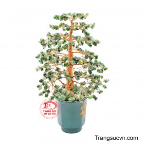 Phần tán được bố cục nhiều tầng, xòe rộng và cân đối, gợi hình ảnh một cổ thụ xanh tốt, tượng trưng cho sự sinh trưởng, bền vững và vượng khí. 